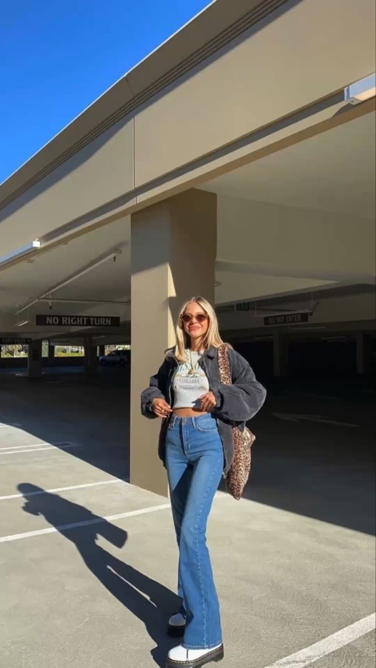 high-waisted blue flared jeans and white chunky boots